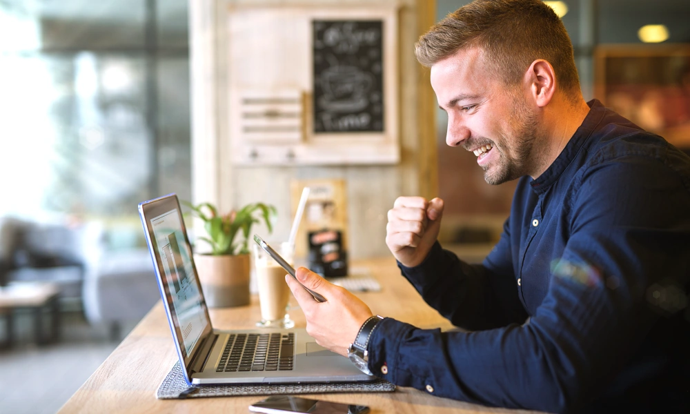 Paradigm Shift Consulting - Annual GDP Refresher Training - Blog - staff-member-at-laptop-doing-online-refresher-training-happy
