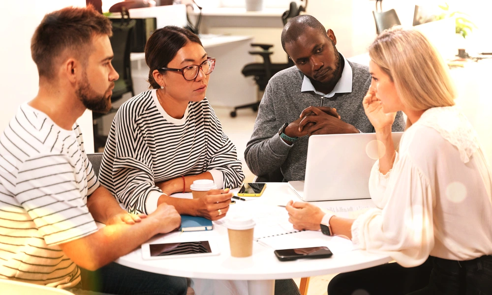 Paradigm Shift Consulting - Why Management Reviews Are Important - Blog - colleagues-having-management-review-meeting